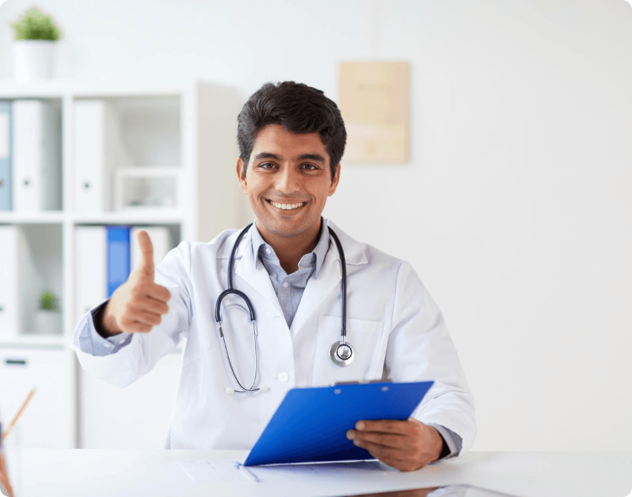 Doctor with clipboard giving thumbs up